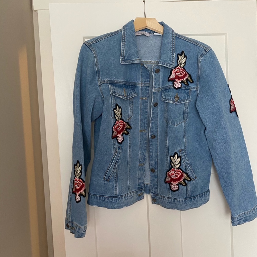 Jean jacket with floral patches